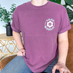 Adult women's vintage berry colored oversized tee shirt with a small Lilac Market logo on the front and a 70's vintage print saying "Lilac Market Headbands" in orange, blue, tan and lilac on the back