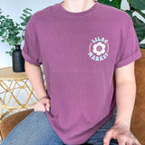 Adult women's vintage berry colored oversized tee shirt with a small Lilac Market logo on the front and a 70's vintage print saying "Lilac Market Headbands" in orange, blue, tan and lilac on the back