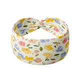 Juniper Floral on Ivory headband featuring watercolor flowers with periwinkle, pink and butter yellow, crafted from a buttery-soft, ultra-stretchy poly-knit blend, designed for versatility and comfort.