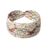 Bloom & Blaze white headband featuring artistic gold, green and red dragons, crafted from a buttery-soft, ultra-stretchy poly-knit blend, designed for reliable non-slip comfort.
