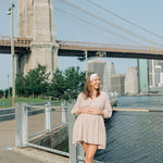 Woman wearing an I Heart NY headband, showcasing its versatile, non-slip design from The Sarah Wallace Collection.