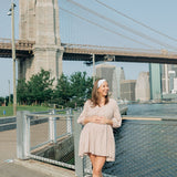 Woman wearing an I Heart NY headband, showcasing its versatile, non-slip design from The Sarah Wallace Collection.