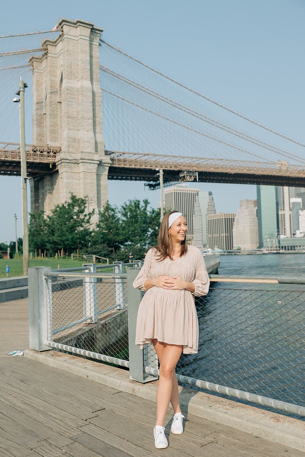 Woman wearing an I Heart NY headband, showcasing its versatile, non-slip design from The Sarah Wallace Collection.