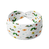 Hungry for Reading white headband featuring artistic gold, green and red dragons, crafted from a buttery-soft, ultra-stretchy poly-knit blend, designed for reliable non-slip comfort.