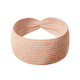 Spiced Peach headband featuring a knotted design, versatile twist style, and double-layer fabric, ideal for workouts, long shifts or daily wear from the Jen Hamilton Collection.