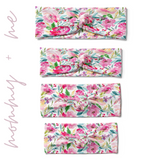 Riley Floral on Ivory headbands in adult, child, toddler and baby sizes. Adjustable bow tie style for all ages, machine washable, ultra-soft poly-knit blend. Designed in Springfield, MO.