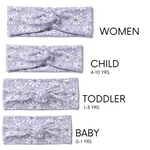 Darby Floral on Purple headbands in adult, child, toddler and baby sizes. Adjustable bow tie style for all ages, machine washable, ultra-soft poly-knit blend. Designed in Springfield, MO.