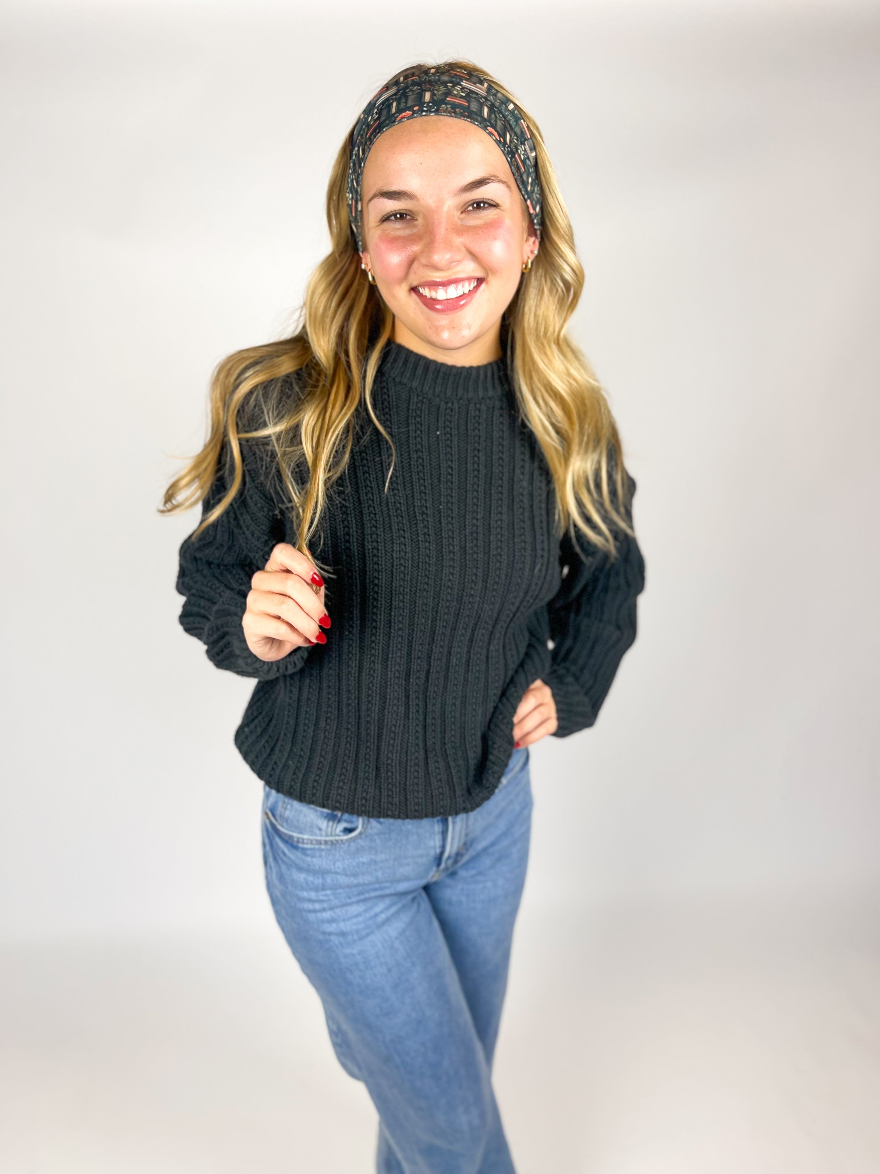 Woman wearing The Enchanted Garden headband, showcasing its versatile 3-in-1 twist style and buttery-soft, non-slip fabric, ideal for work or play.