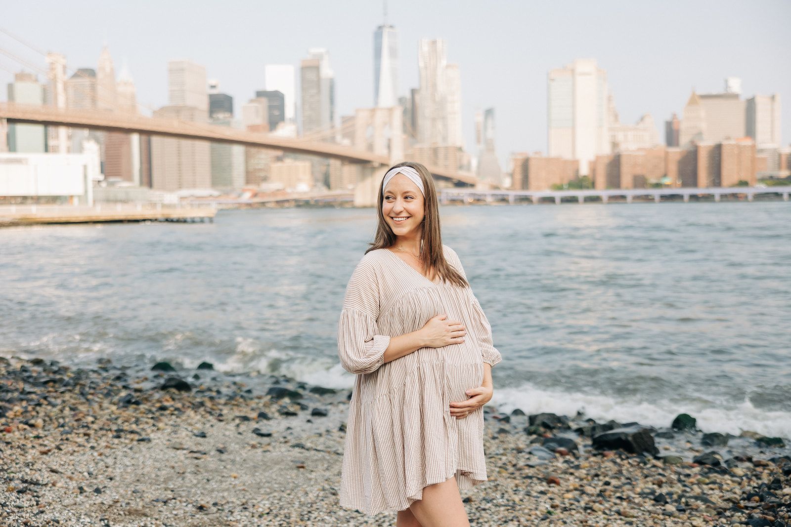 Woman wearing Unconditional headband from The Sarah Wallace Collection. Headband is versatile, non-slip, and sweat absorbent, perfect for various activities.