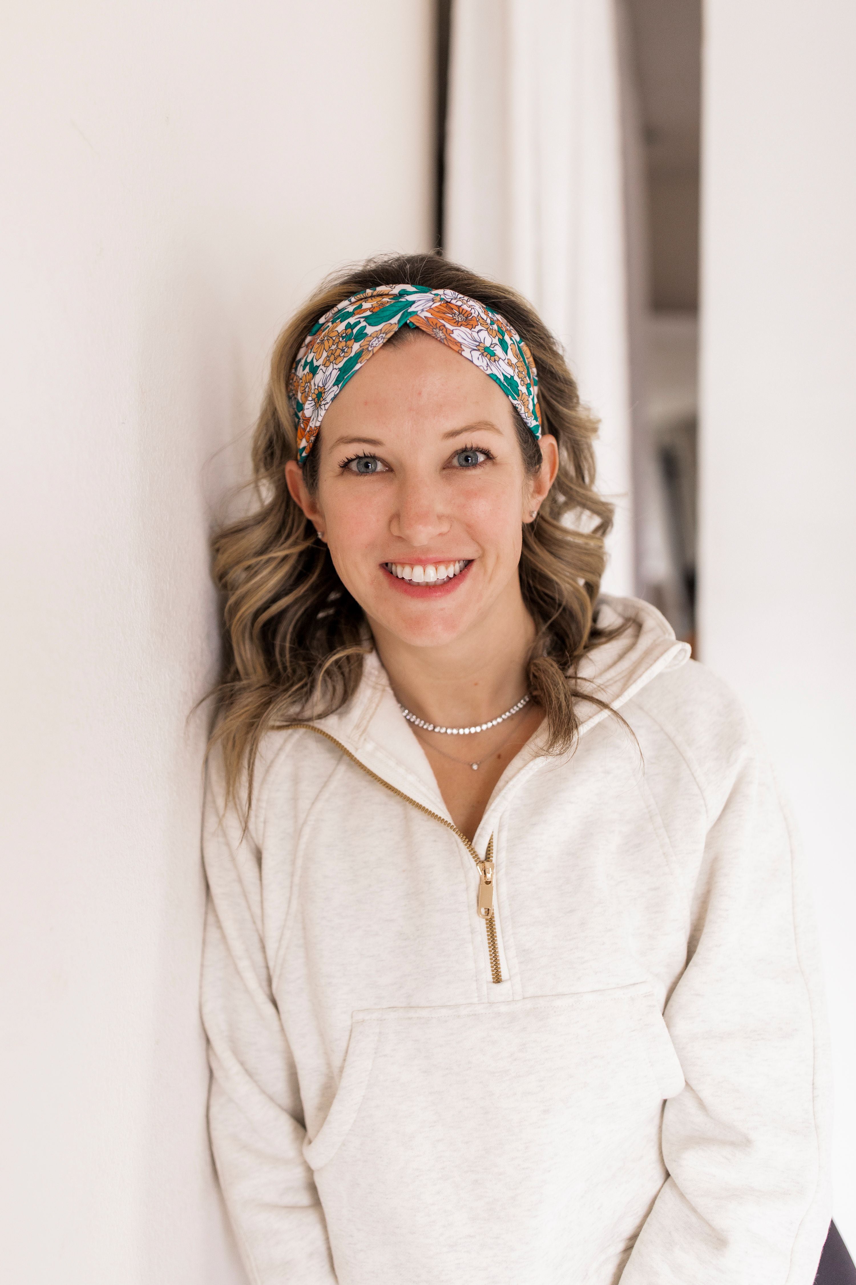 Adult women's beige headband with teal, orange and white floral print