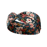 Keely Floral on Black headband, featuring a red, pink, white, blue and green floral pattern, crafted from soft poly-knit blend for versatile wear and non-slip performance.