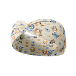 Heeler at Heart tan headband featuring Bluey characters, coordinating daisies and musical notes, crafted from a buttery-soft, ultra-stretchy poly-knit blend, the most comfortable hair accessory ever.