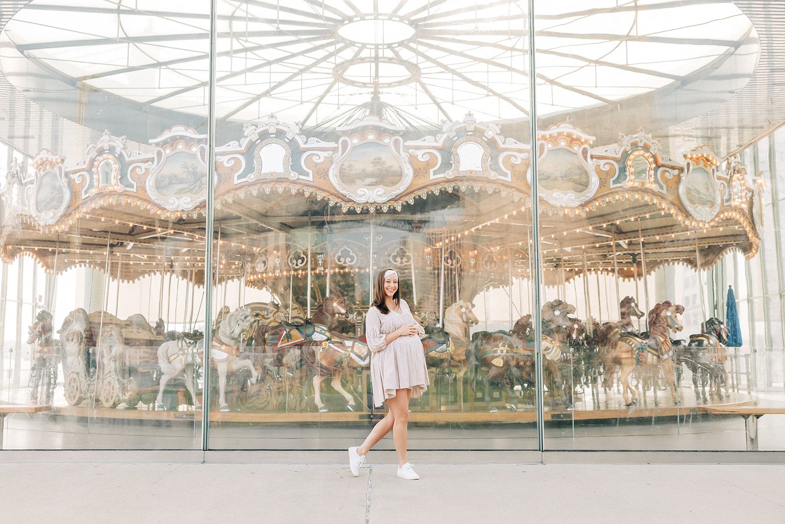 Woman smiling, wearing The Corey headband, a versatile and functional poly-knit blend from The Sarah Wallace Collection, the perfect accessory for easy hairstyles.
