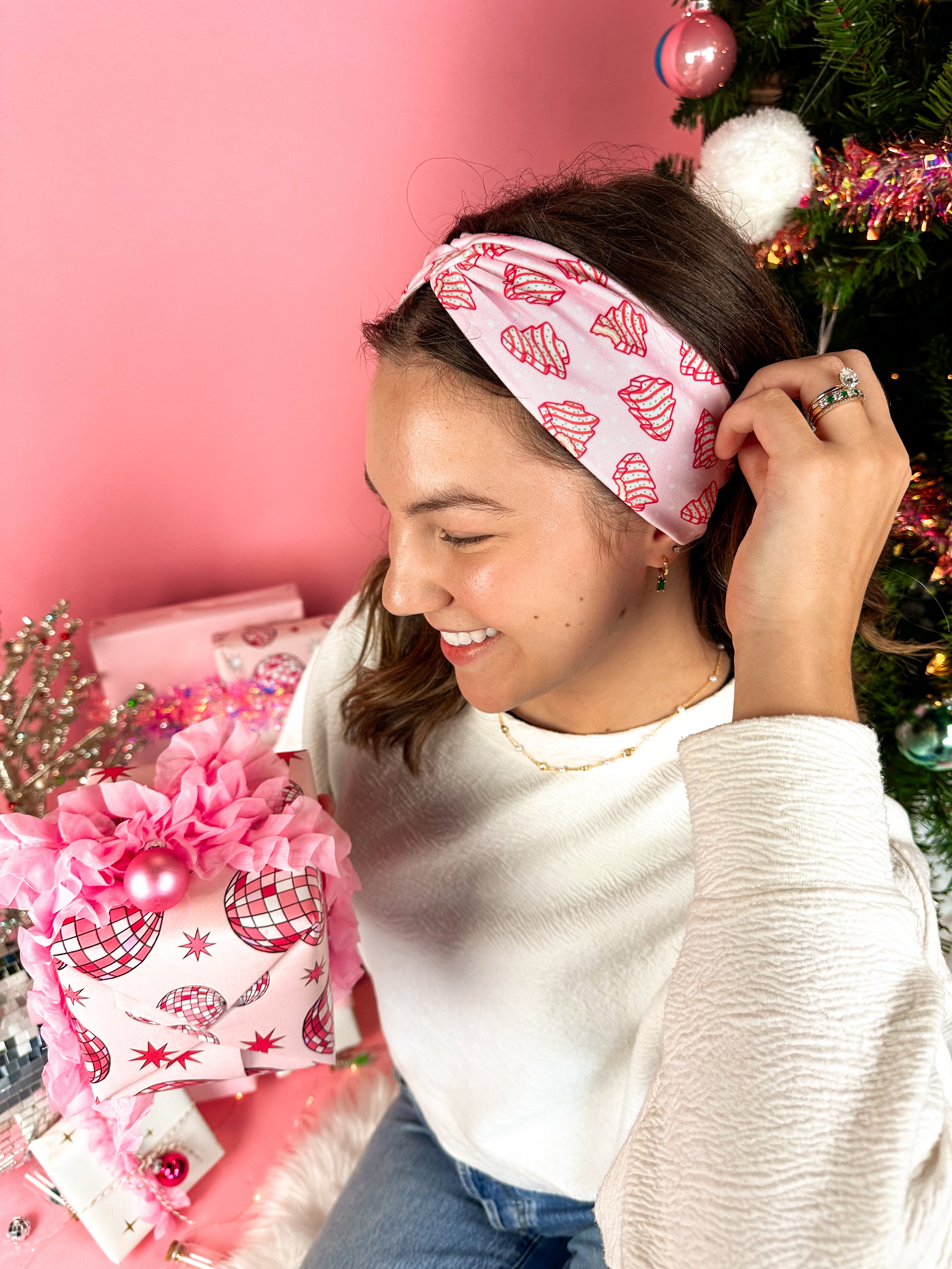 Woman confidently wearing the Torn Between Looking Like a Snack and Eating One headband, showcasing its versatile, non-slip design.