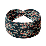 A black headband with text Beautiful Day to Catch Babies and foot prints with rainbows, flowers and hearts. Versatile, soft, non-slip, absorbent fabric for confidence and function.