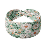 A headband with a white and tan floral pattern, Brandi Floral on Mint, featuring unique daisy flower designs. Versatile 3-in-1 twist style, sweat absorbent, non-slip, machine washable, designed in Springfield, MO. Sizes for women and children.