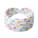 Headband with colorful footprints, versatile 3-in-1 twist style for confident, functional wear.