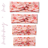 A group of pink twist knot headbands for you and your mini me, featuring Mickey Mouse ears and flower design, with adjustable fit for toddlers and babies.