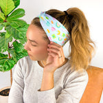 Adult women's soft teal headband with allover marshmallow cereal print