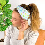 Adult women's soft teal headband with allover marshmallow cereal print