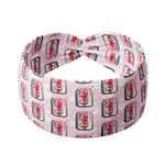 A pink headband with white flowers and a Diet Coke and pink ribbon print, designed for confidence and function. Features include one size fits most, machine washable, ultra stretchy poly-knit blend, 3-in-1 twist style, sweat absorbent, and non-slip.