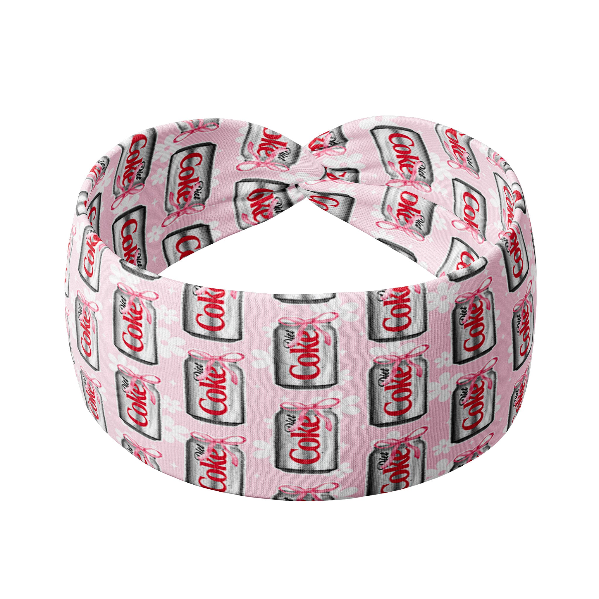 A pink headband with white flowers and a Diet Coke and pink ribbon print, designed for confidence and function. Features include one size fits most, machine washable, ultra stretchy poly-knit blend, 3-in-1 twist style, sweat absorbent, and non-slip.