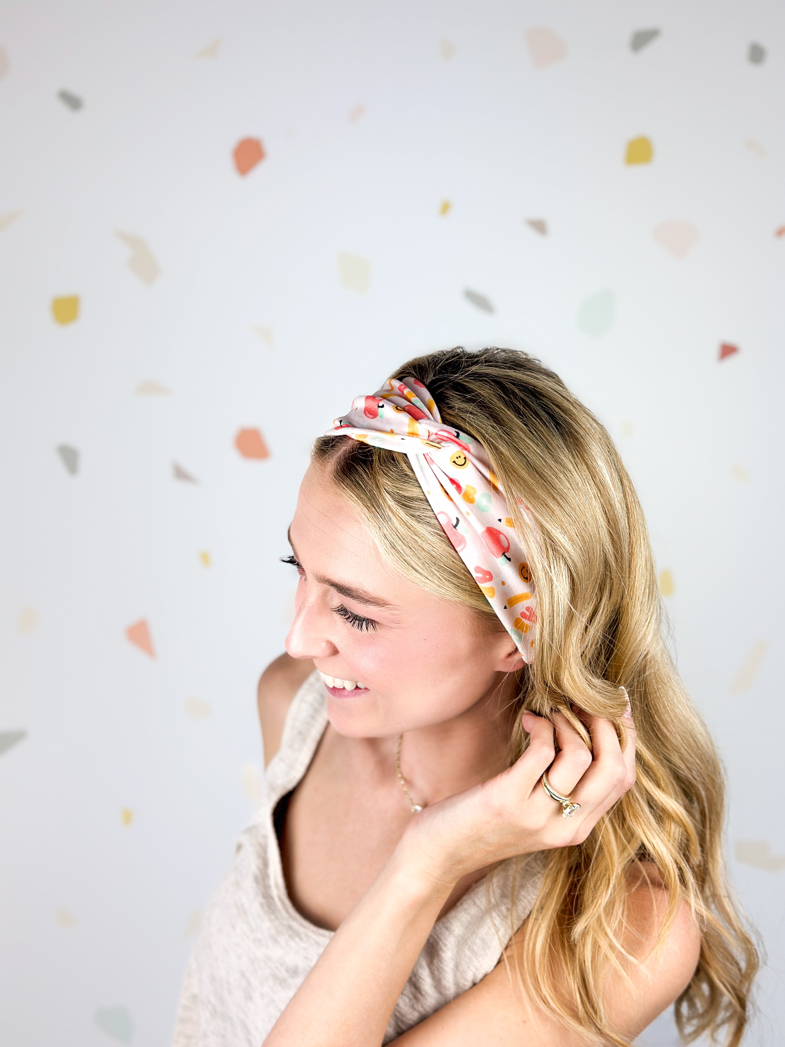 Woman confidently wearing the Don't Make Me Use My Teacher Voice headband, showcasing its comfortable 3-in-1 twist style.