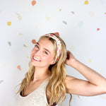Woman confidently wearing the Don't Make Me Use My Teacher Voice headband, showcasing its comfortable 3-in-1 twist style.