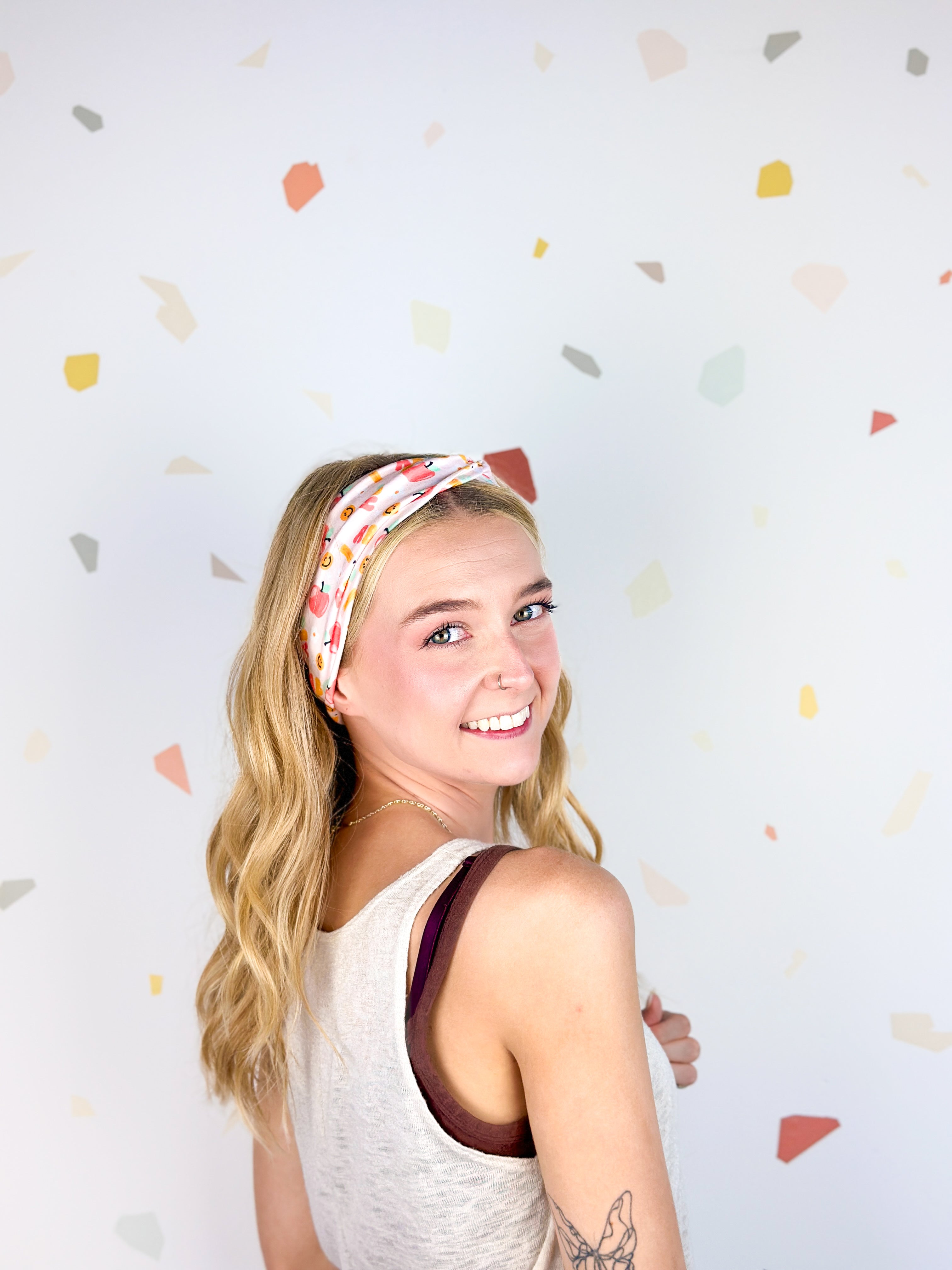 Woman confidently wearing the Don't Make Me Use My Teacher Voice headband, showcasing its comfortable 3-in-1 twist style.