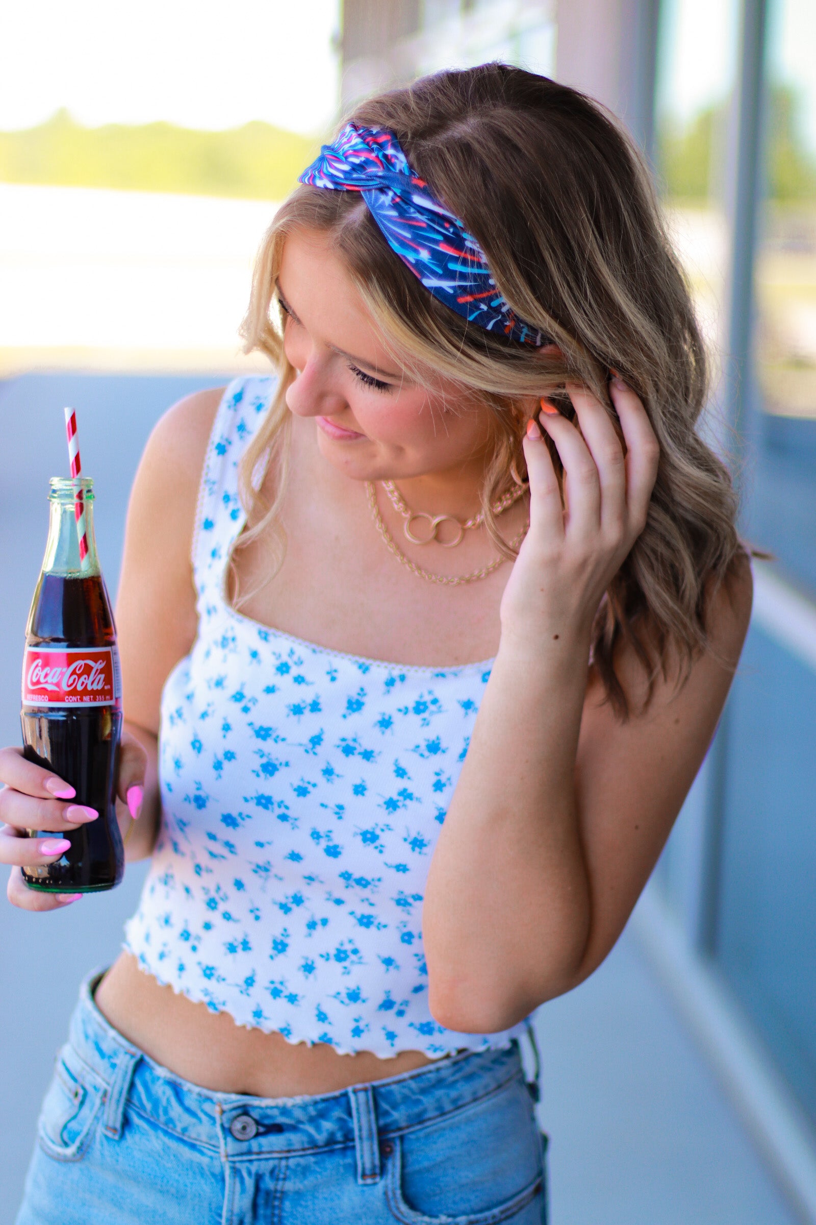 Adult women's navy headband with red, white and blue firework and star design