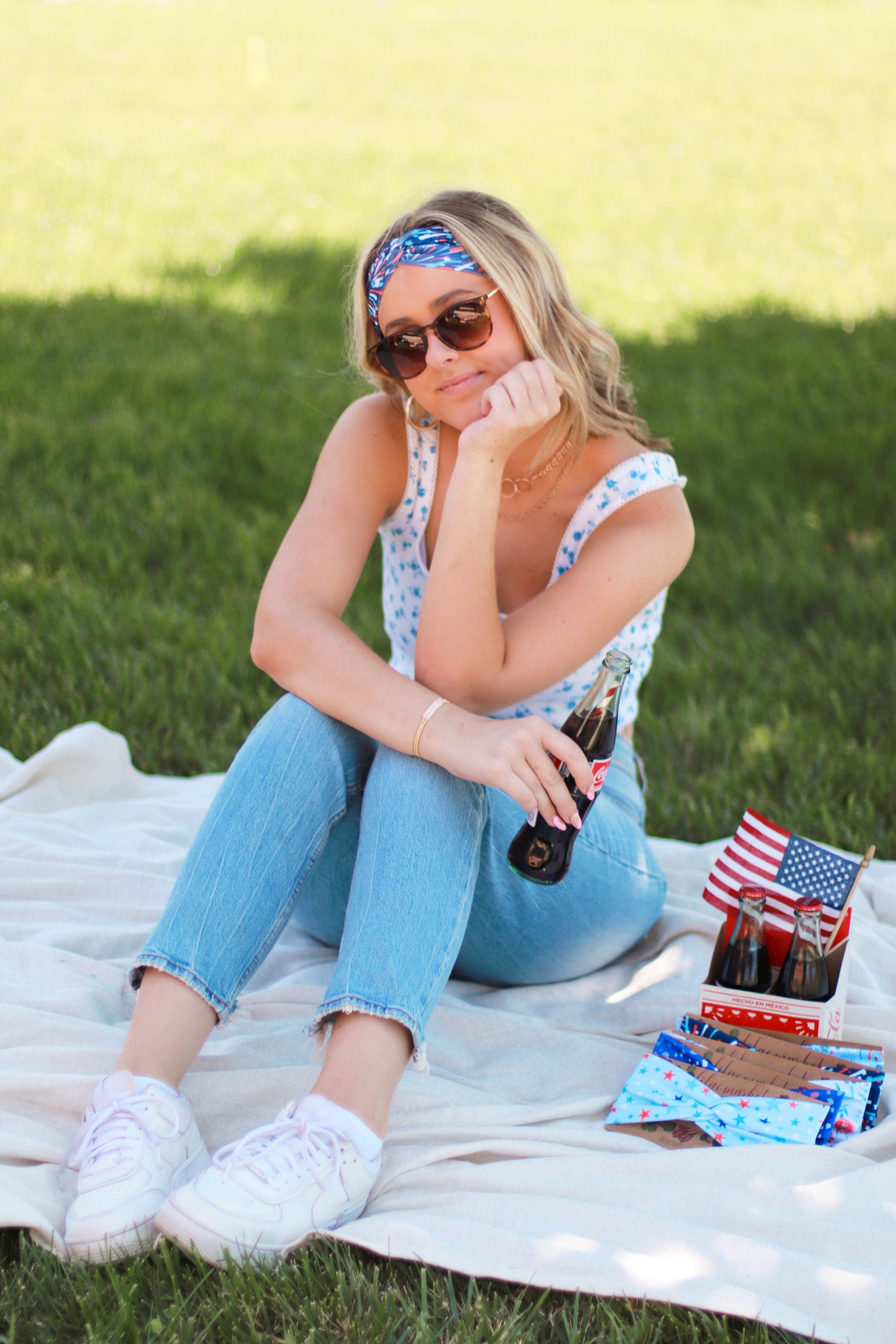 Adult women's navy headband with red, white and blue firework and star design