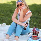 Adult women's navy headband with red, white and blue firework and star design
