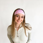 Woman with long hair wearing a Mia Floral on Ivory headband, showcasing its versatile 3-in-1 twist style and non-slip style perfect for workouts.