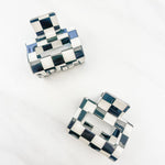 Checking In Lilac Clip: a 2-inch glossy black checkered claw clip with a hinge closure, perfect for styling and keeping hair in place.