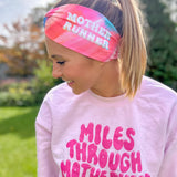 Adult women's acid wash watercolor in hot pink, orange, blue and yellow with the white 70's bubble font saying "Mother Runner".