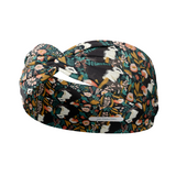 Adult women's black headband with artistic black and white skunk and teal, gold, pink and white allover flowers