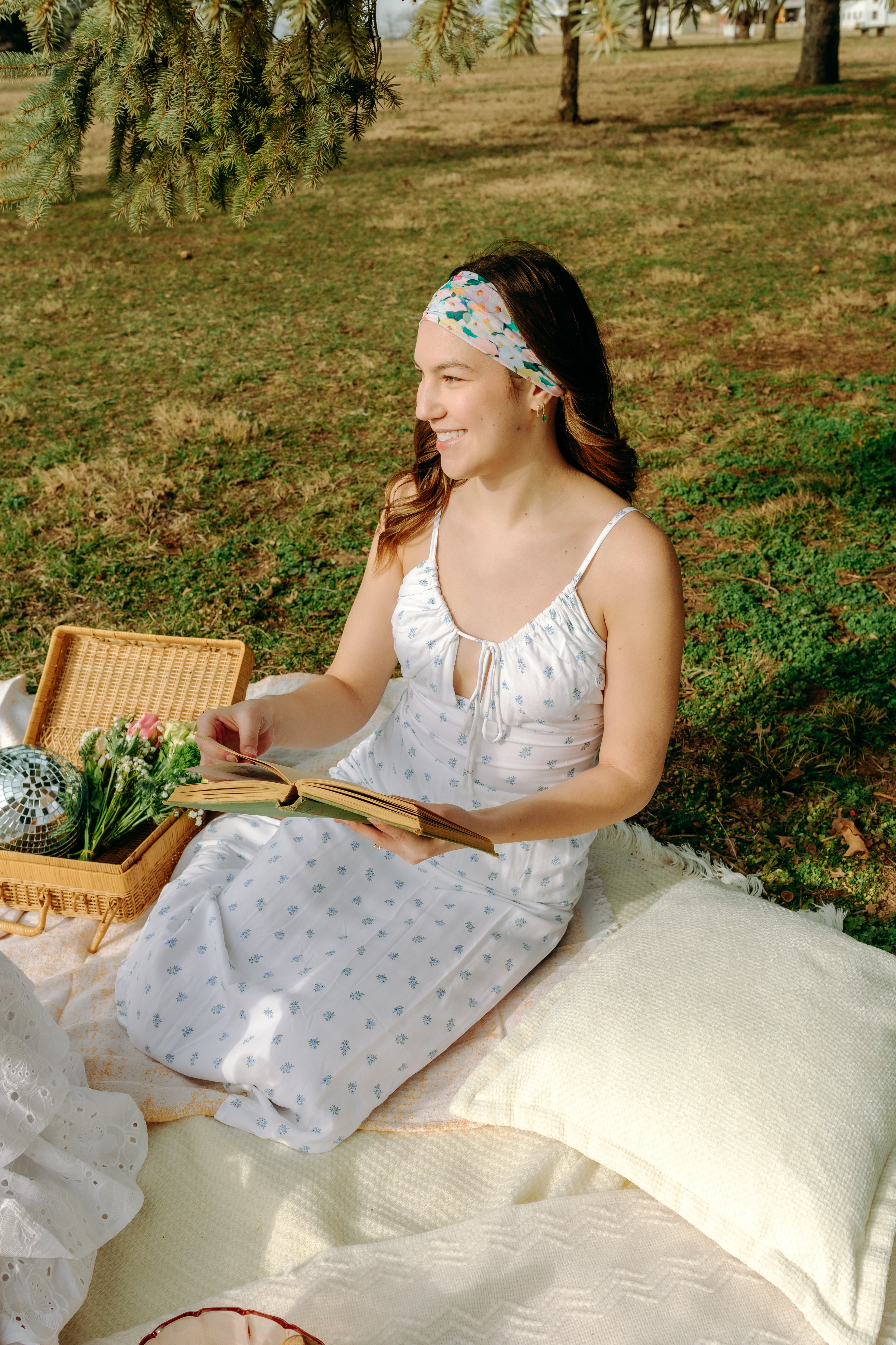 Woman with long hair confidently wearing the Tori Floral on Sage headband, the perfect non-slip accessory for long shifts or play days.