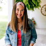Woman with long straight hair type happily wearing the most comfortable hand-made headband in the print Life is Sweet.