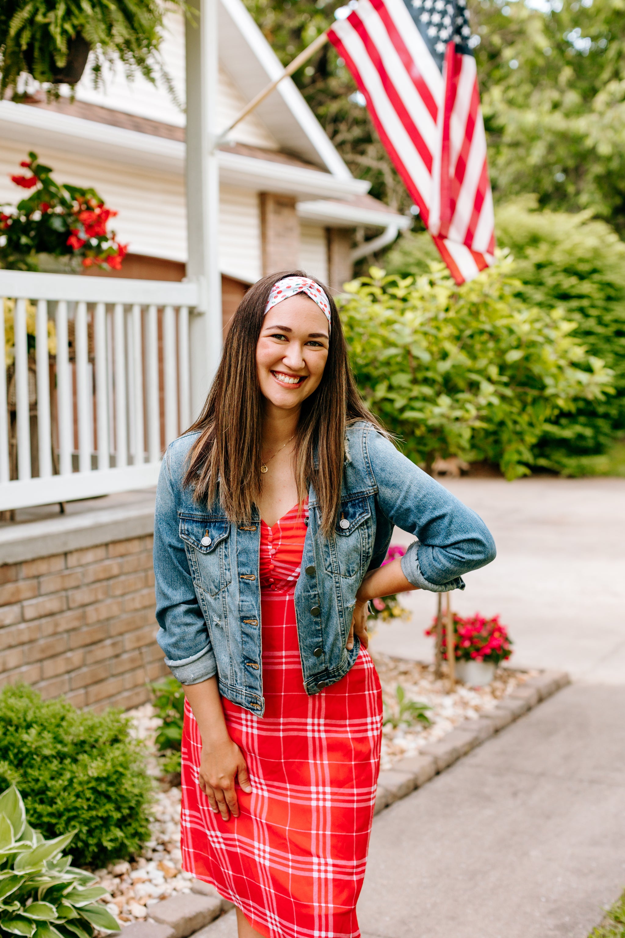 Woman with long straight hair type happily wearing the most comfortable hand-made headband in the print Life is Sweet.