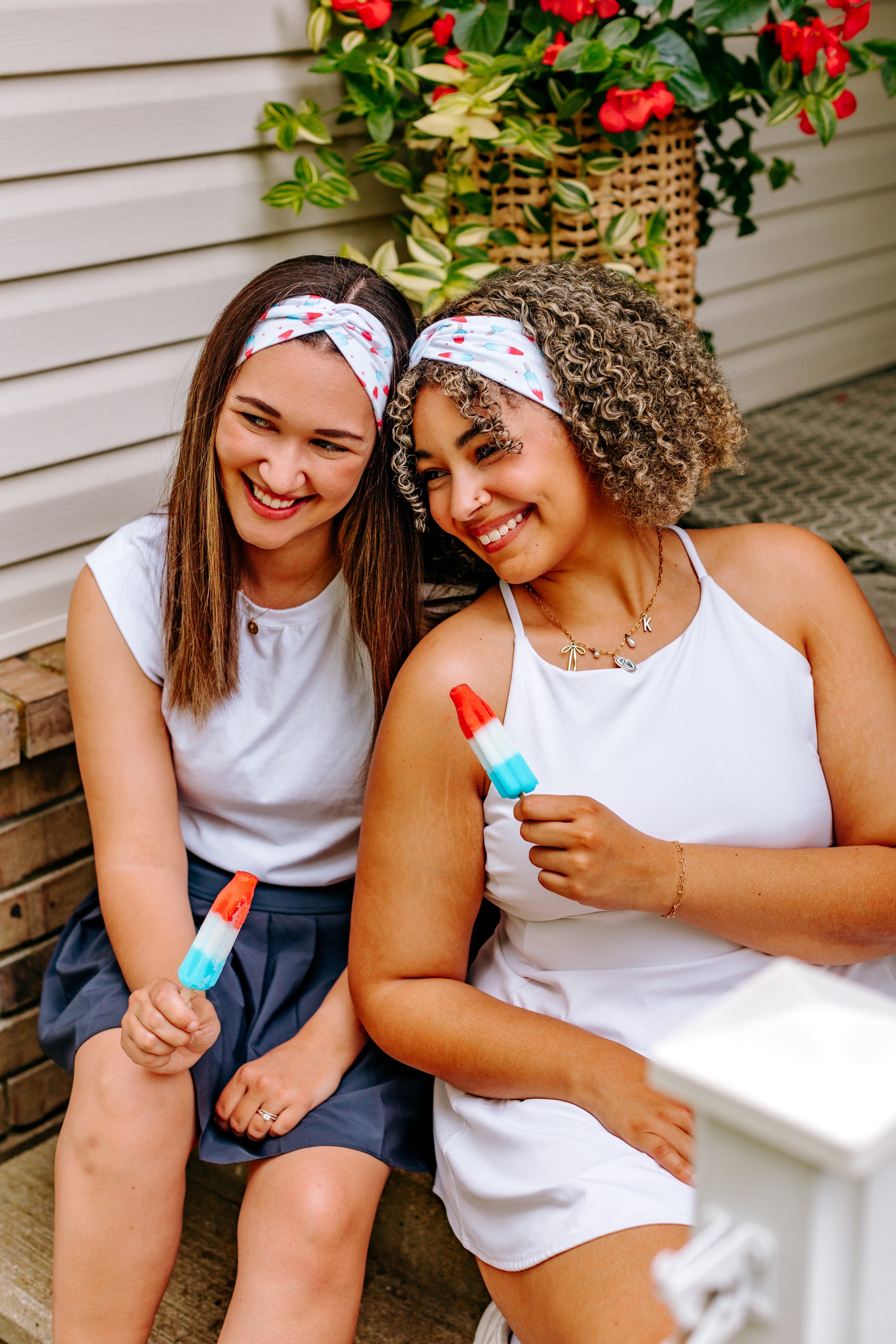 Women with different hair types happily wearing the most comfortable hand-made headband in the print Stay Cool. 