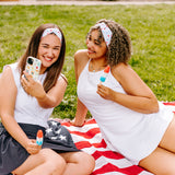 Women with different hair types happily wearing the most comfortable hand-made headband in the print Stay Cool.