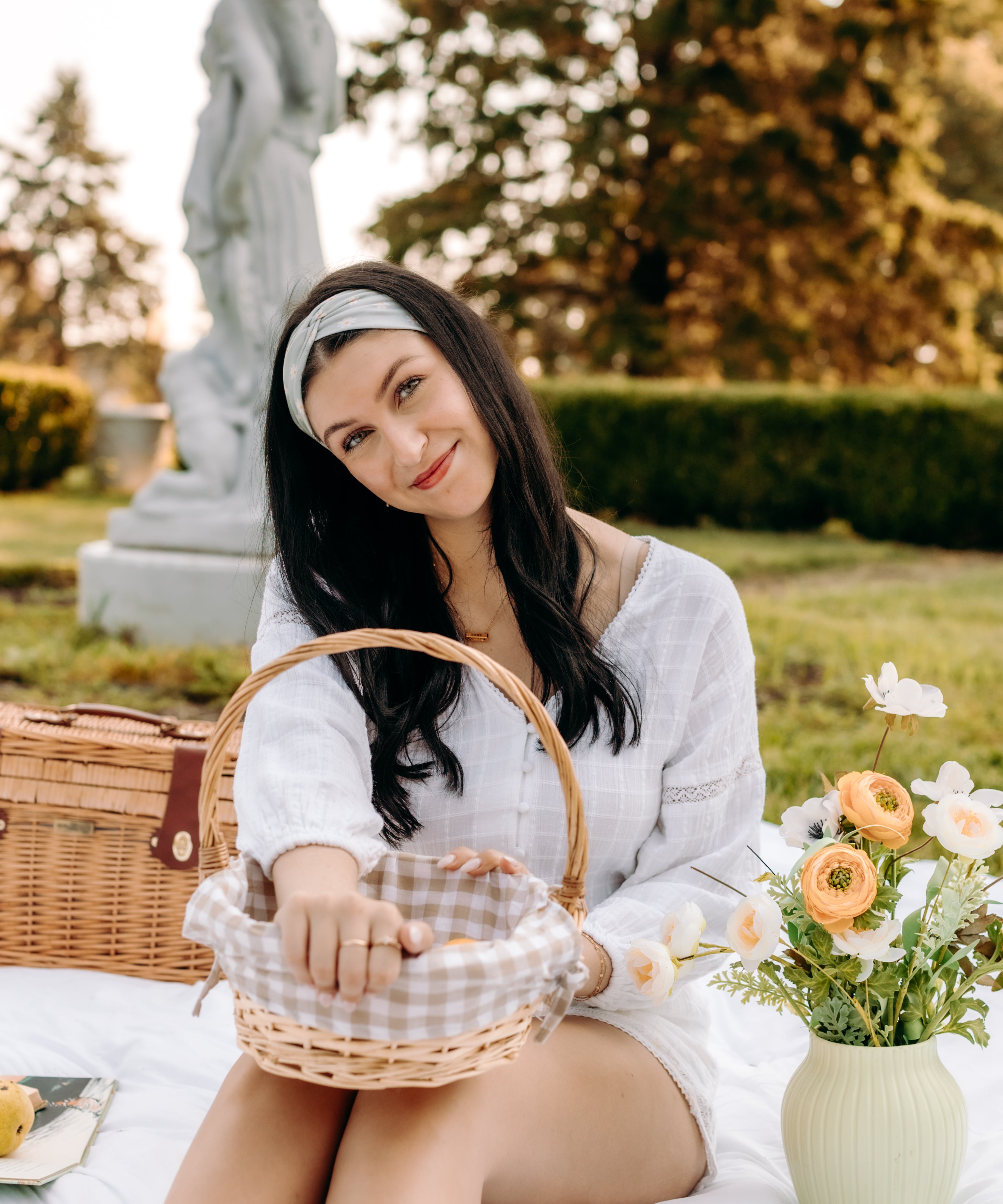 Woman with long hair happily wearing the most comfortable hand-made headband in the print Wren Floral.