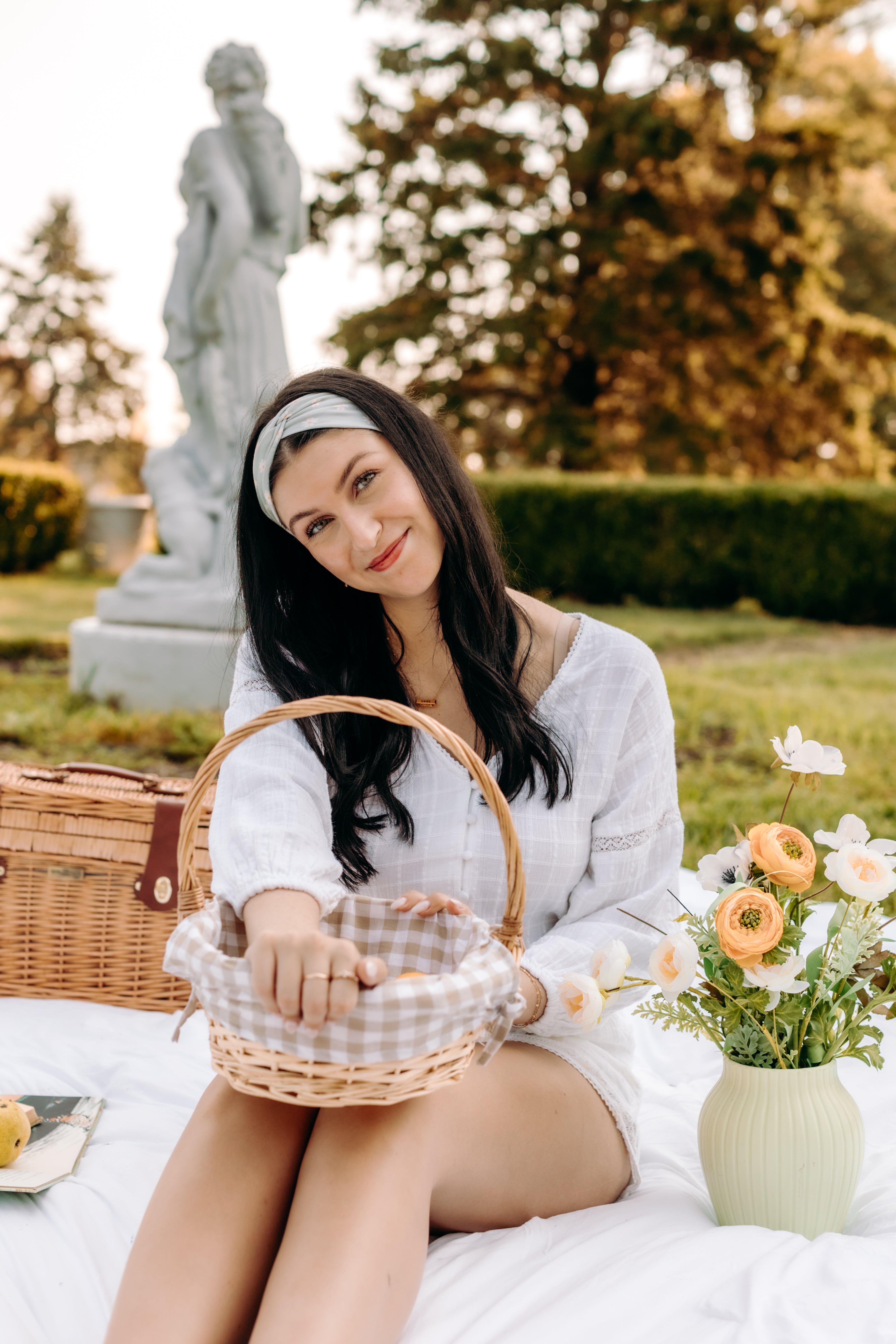 Woman with long hair happily wearing the most comfortable hand-made headband in the print Wren Floral.