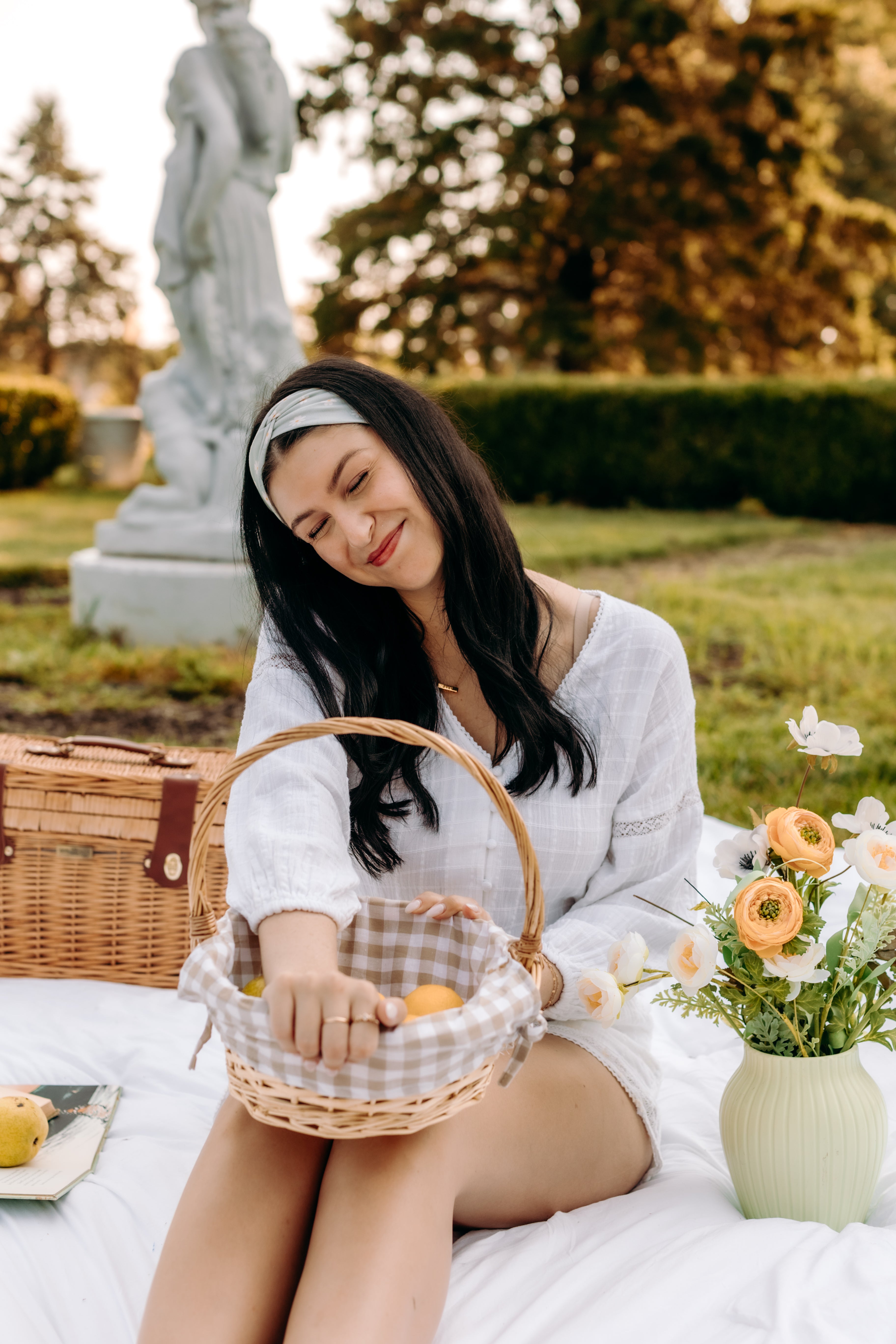 Woman with long hair happily wearing the most comfortable hand-made headband in the print Wren Floral.