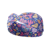 Ask Us About Our Warm Blankets blue headband featuring bandaids, desert flowers, cacti, medical bags and stethoscopes, crafted from a buttery-soft, ultra-stretchy poly-knit blend, the most comfortable hair accessory ever.