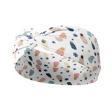A white headband with babies in blankets pattern on it.