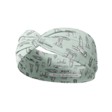 Blue headband from The Sarah Wallace Collection featuring I Heart NY design with buildings. Ultra-stretchy, machine washable, non-slip, and versatile 3-in-1 twist style.
