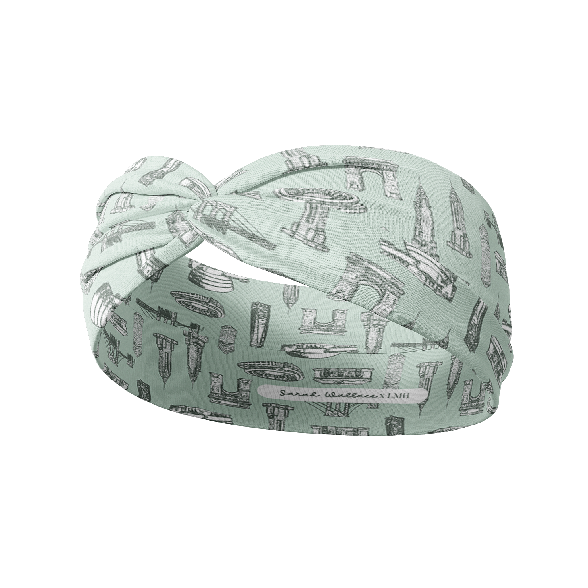 Blue headband from The Sarah Wallace Collection featuring I Heart NY design with buildings. Ultra-stretchy, machine washable, non-slip, and versatile 3-in-1 twist style.