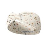 Sarah Floral on Ivory headband featuring a white base adorned with floral designs, crafted in a buttery-soft, ultra-stretchy poly-knit blend for versatile wear.