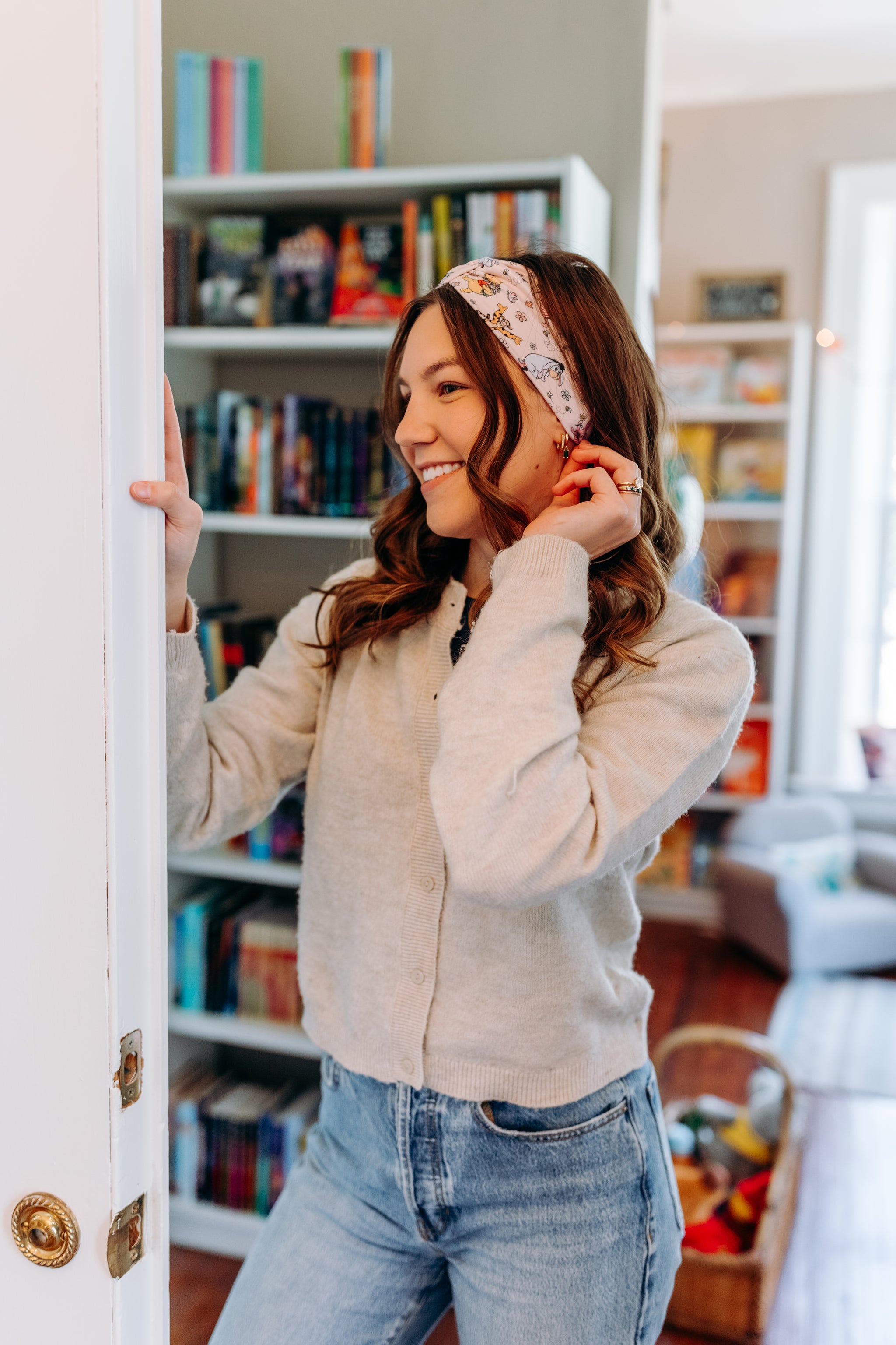 Woman confidently wearing the Limited Edition Hunny & Friends headband for cute hairstyles and comfortable all-day wear.